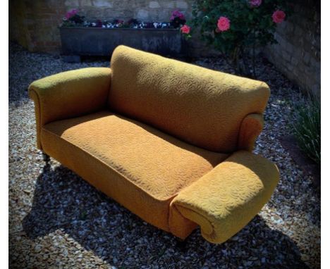 A 19th century? Victorian 2 seater drop arm sofa in ochre fabric.