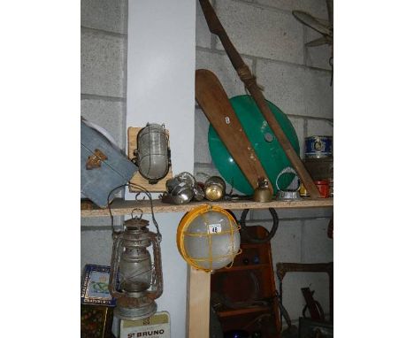 A mixed lot including tins, hurricane lamp etc.,