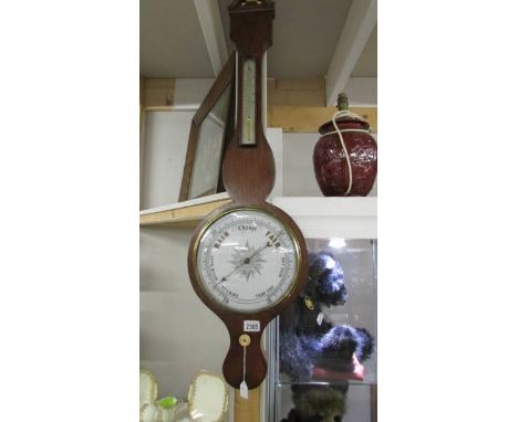 A Victorian mahogany barometer.