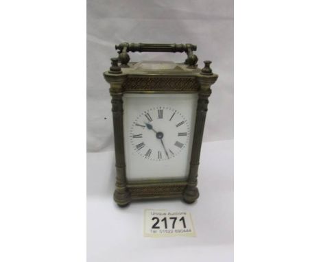 A brass carriage clock with key and in working order.