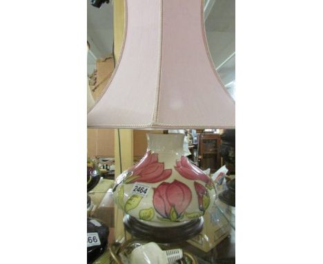 A Moorcroft table lamp with shade.