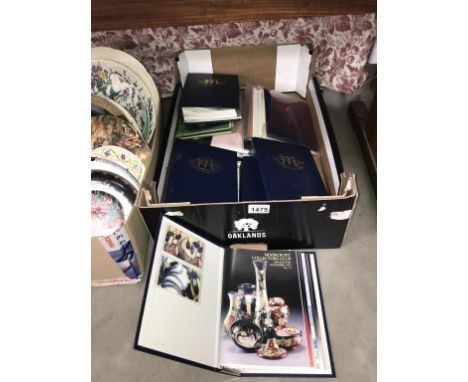 4 folders of Moorcroft collectors club magazines &amp; Moorcroft catalogues etc.