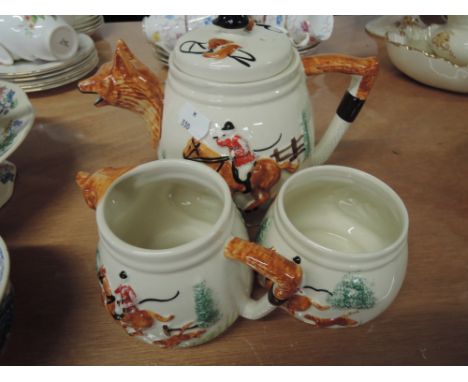 A hunting themed Teapot, cream and sucre