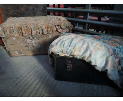 A leather clad travelling trunk and 1 wooden travelling truck both fabric covered