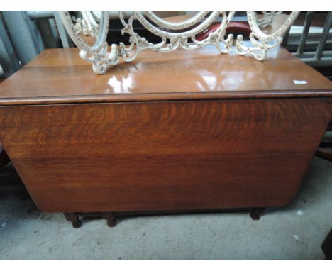 A gate leg drop leaf table