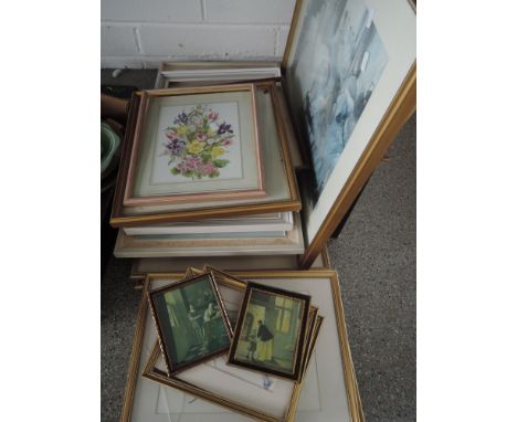A shelf of various pictures 