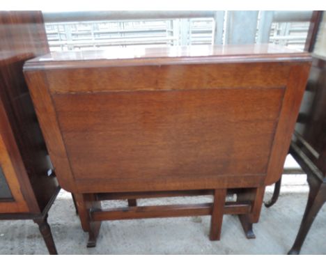 A gate leg drop leaf table