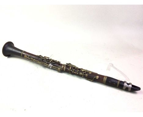 A 'C' CLARINET, BY K. H. MEISSNER with Console mouthpiece60cm long