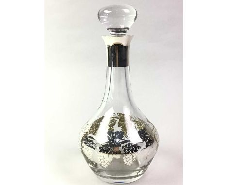 TWO GLASS DECANTERS, ALONG WITH TWO SALVERS the decanters each with a stopper and overlaid with silver vine decoration, one c