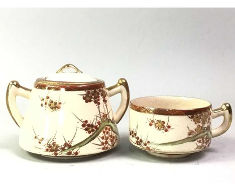 JAPANESE POTTERY TEA SERVICE, decorated with prunus, comprising six cups, four saucers, three side plates, teapot, sugar bowl
