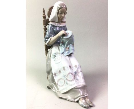 GROUP OF LLADRO AND NAO FIGURES,  including a lady embroidering, a ballerina and other figures  Embroidery figure 27cm high  