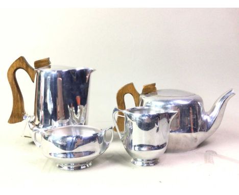 PICQUOT WARE FOUR PIECE TEA SERVICE, comprising tea pot, water pot, sugar bowl and cream jugthe water pot - 18.5cm highQty: 4