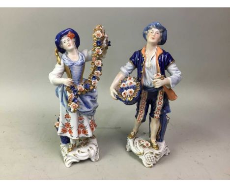 PAIR OF SITZENDORF FIGURES, AND A PAIR OF GERMAN PORCELAIN SHOES  the figures carrying flowersfigures 23cm highQty: 4