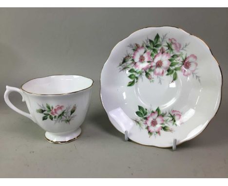 ROYAL ALBERT TEA SERVICE, AND A TUSCAN TEA SERVICE the Royal Albert service in the Wild Rose pattern and the Tuscan service i