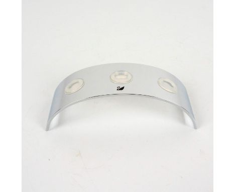 A chrome curve display stand for Swarovski 3 tulip flowers from 2002 to 2004. Gifted to Swarovski Collectors Society members.