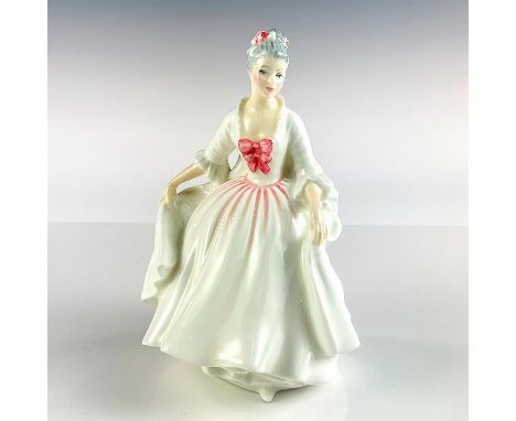 Lady in white ball gown with pink bow details. Royal Doulton backstamp.This item has no reserve. Issued: 20th c.Dimensions: 7