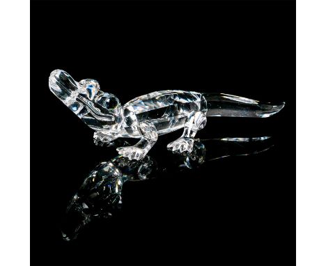 Clear crystal body with yellow and black eyes. 7661 NR 000 005. Swarovski backstamp. This item has its original box: 3.75"L x