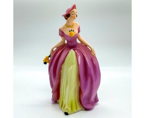 Hand painted stunning figure of woman dressed in a pink and yellow off the shoulder dress with matching hat; holding a bouque