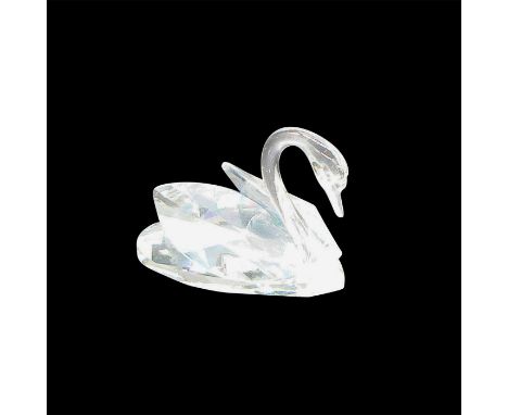 Clear, delicate lines on figurine. Swarovski backstamp. 7633 NR 063 000. This item has its original box: 3.25"L x 3.25"W x 2.