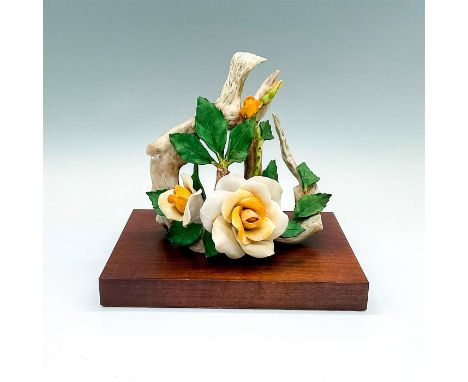 A beautiful naturalistic floral figure of yellow-white roses on a curved branch. Cybis mark on the side This item has a base 