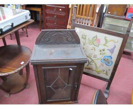 Early XX Century Stained Mahogany Wall Cabinet, with a leaded glazed door, together with an early XX Century fire screen with