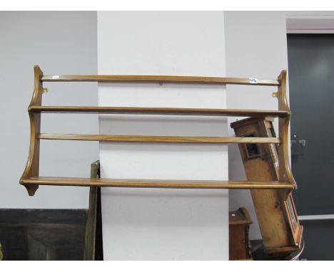  Ercol, Wall rack with shaped sides, two shelves 97cm wide.