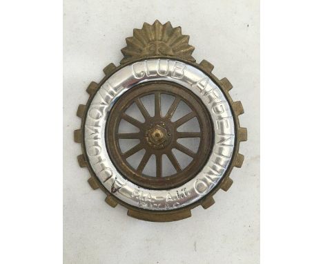 An Automobile Club of Argentina car badge.