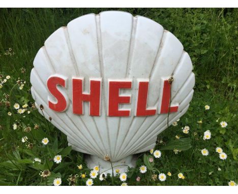 A Shell glass petrol pump globe, damaged with crack.