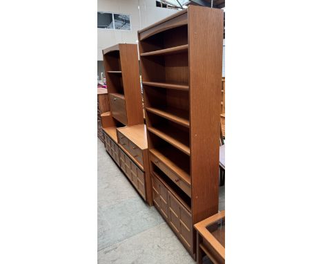 A Parker Knoll for Nathan  teak bookcase with a matching side cabinet and a drinks cabinet with corner unit 