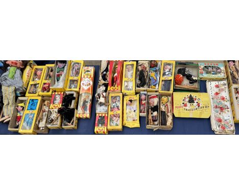 A large collection of Pelham puppets including Ventriloquial Puppet, Scotsman, Pinocchio, Giant, foal, poodles, fairy, Police