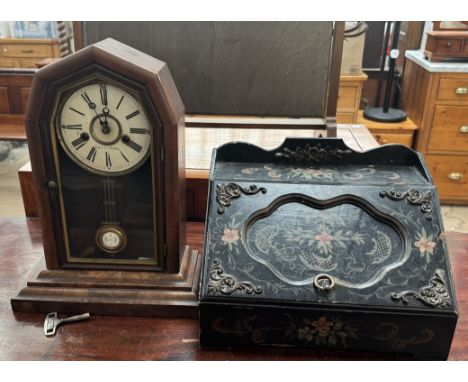 A walnut cased mantle clock with a circular dial and Roman numerals together with a painted ebonised table top box