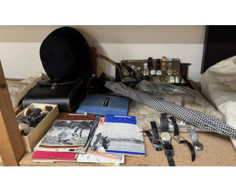 A collection of Gentleman's wristwatches including Waltham, Majex, Salam, Silvana etc together with Angling magazines, binocu