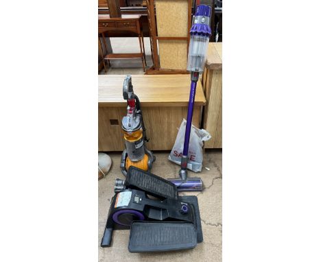 A Dyson Cyclone V10 Animal vacuum cleaner together with a Dyson Ball Vacuum cleaner and a Cubii step machine (Sold as seen, u
