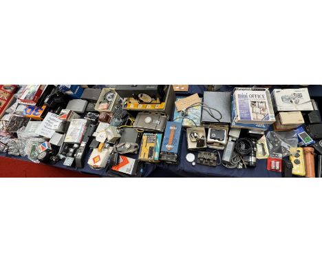 A Polaroid 800 camera together with a Kodak Junior Six-20 Series II camera, a Kodak Cavalcade projector, other cameras and ca