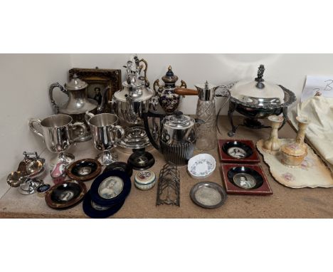 An electroplated kettle on stand together with a claret jug, other electroplated wares, miniatures, part dressing table set, 