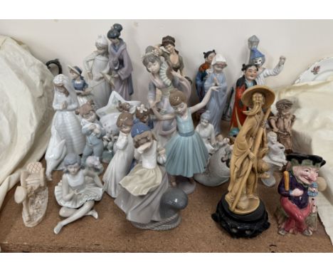 A collection of Nao and other porcelain and pottery figures etc 