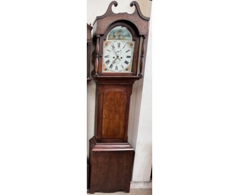 A stained pine and beech longcase clock, with a broken swan neck pediment and ring turned columns with a long trunk door, box