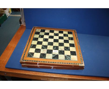 An inlaid Box containing chess men, draughts and backgammon board.