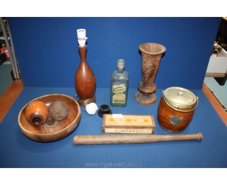 A box of wooden items including a biscuit barrel, rounders bat, lamp etc.