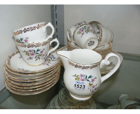 A Royal Grafton part tea service including six cups, eight saucers, nine tea plates, a bread and butter plate and milk jug, c