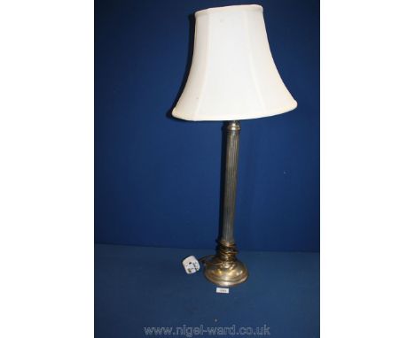 A tall vintage Chrome column lamp base.