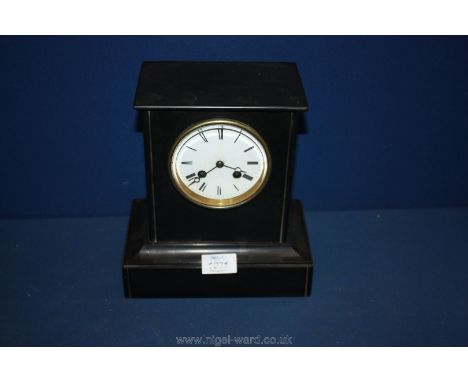 A black onyx mantle clock.