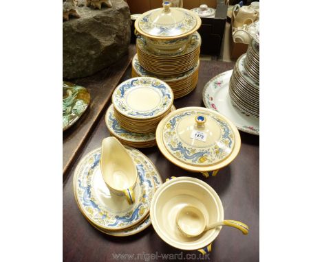 A Minton dinner service (C5112) including eleven dinner plates, six plates, twelve side plates, twelve soup bowls, gravy boat