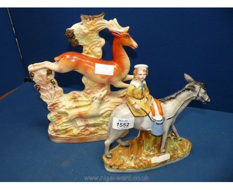 A Staffordshire figure of hound hunting a deer, a/f and another entitled Milk.