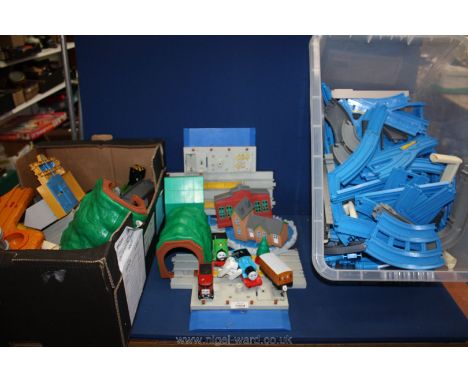 A good quantity of Thomas the Tank Engine rail track and stock including tunnels, sheds, cranky cranes, Thomas, Harold the He