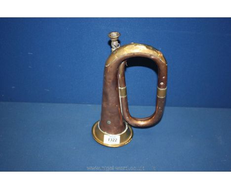 A brass and copper bugle.
