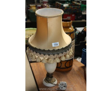 An ornate table lamp.