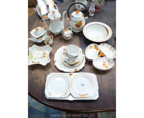 A quantity of mixed Myott orange/black pattern Teaware including biscuit barrel, teapot, coffee pot, etc.