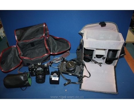A Chinon CE Memotran Camera and lenses in soft carrying case and a Zenith II camera, etc.