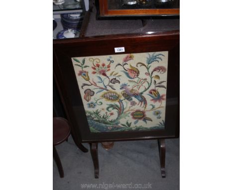 A folding firescreen